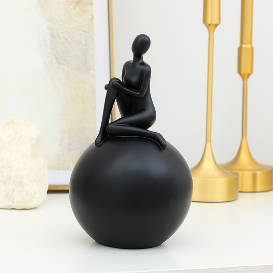 Modern Abstract Sculpture – Black Minimalist Figurine on Sphere